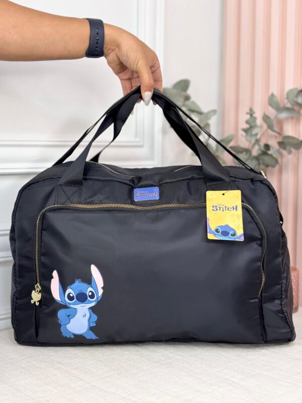 518081061_122145193670750945_8511406113354356373_n Maletín Disney Stitch negro